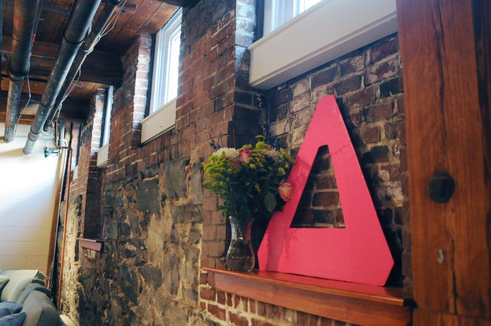 The Delta Gamma sign sits on display in the new DG House.