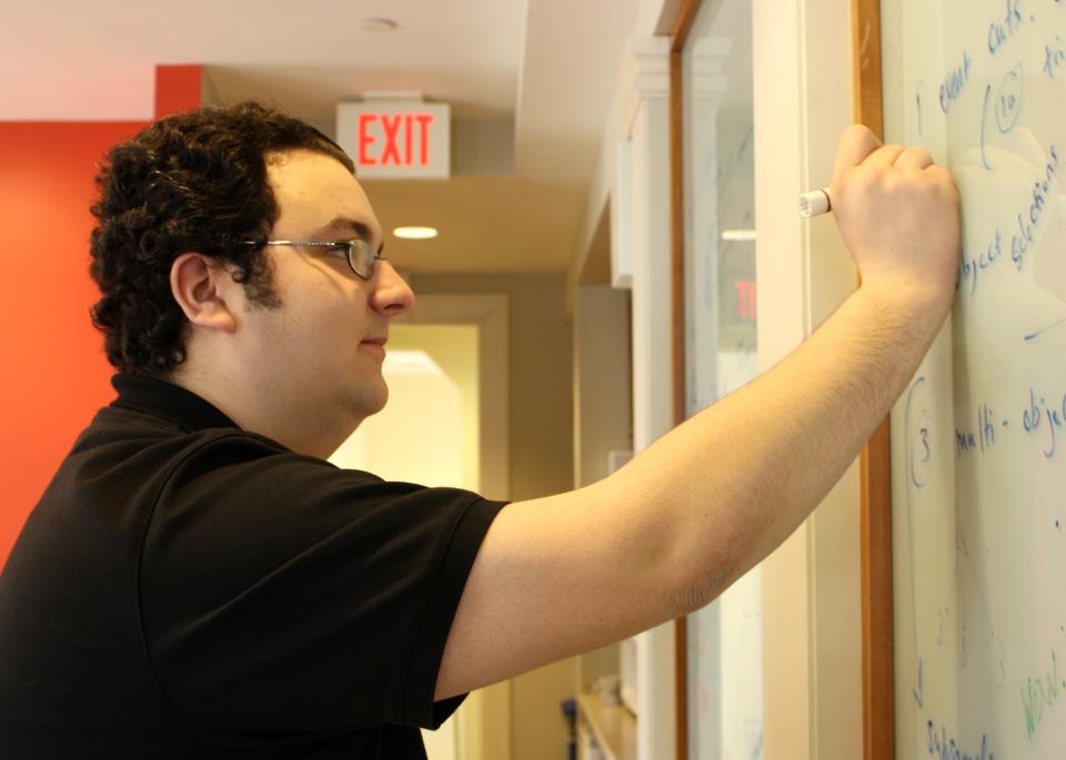 Tomo Lazovich '11 works to identify and filter atmospheric particles known as muons.  Lazovich is part of a Harvard particle physics group involved with the ATLAS experiment at the European Organization for Nuclear Research's Large Hadron Collider. 