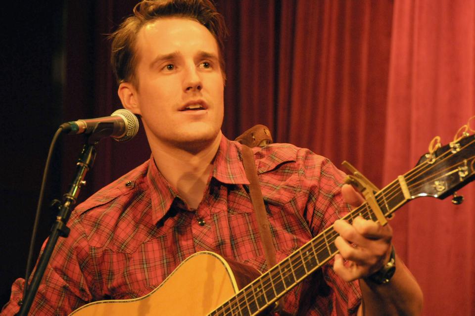 Charles Johnson performs his own love song titled "Squirrel" at the Berklee College's Singer-Songwriter Showcase at Cafe 939 in Boston.