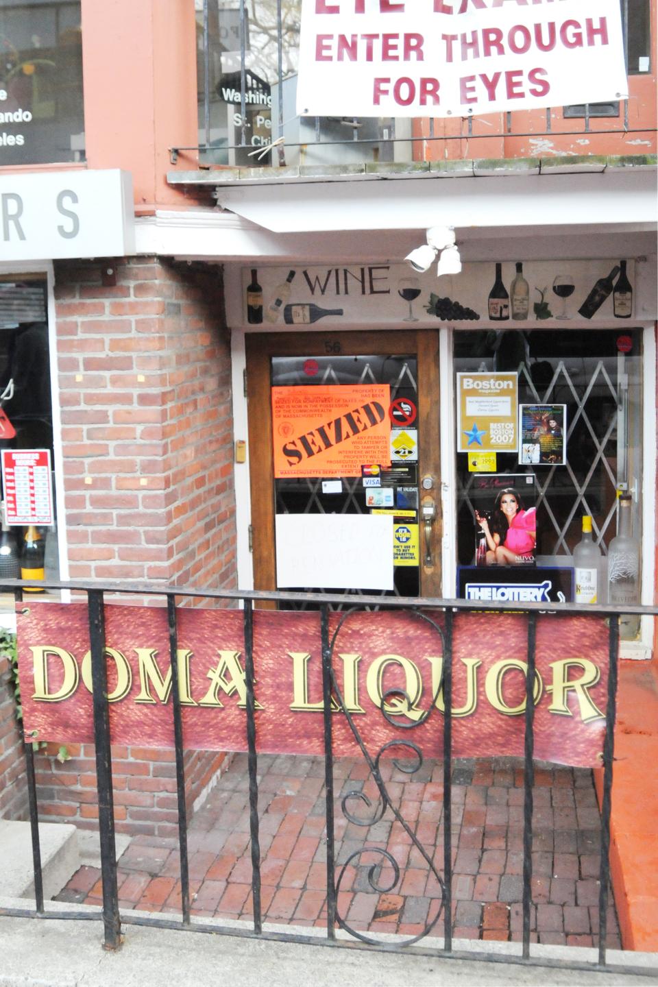 Doma Liquor, located across from Staples on JFK Street, closed yesterday. A sign on the front door reports that Doma was closed for unpaid taxes.