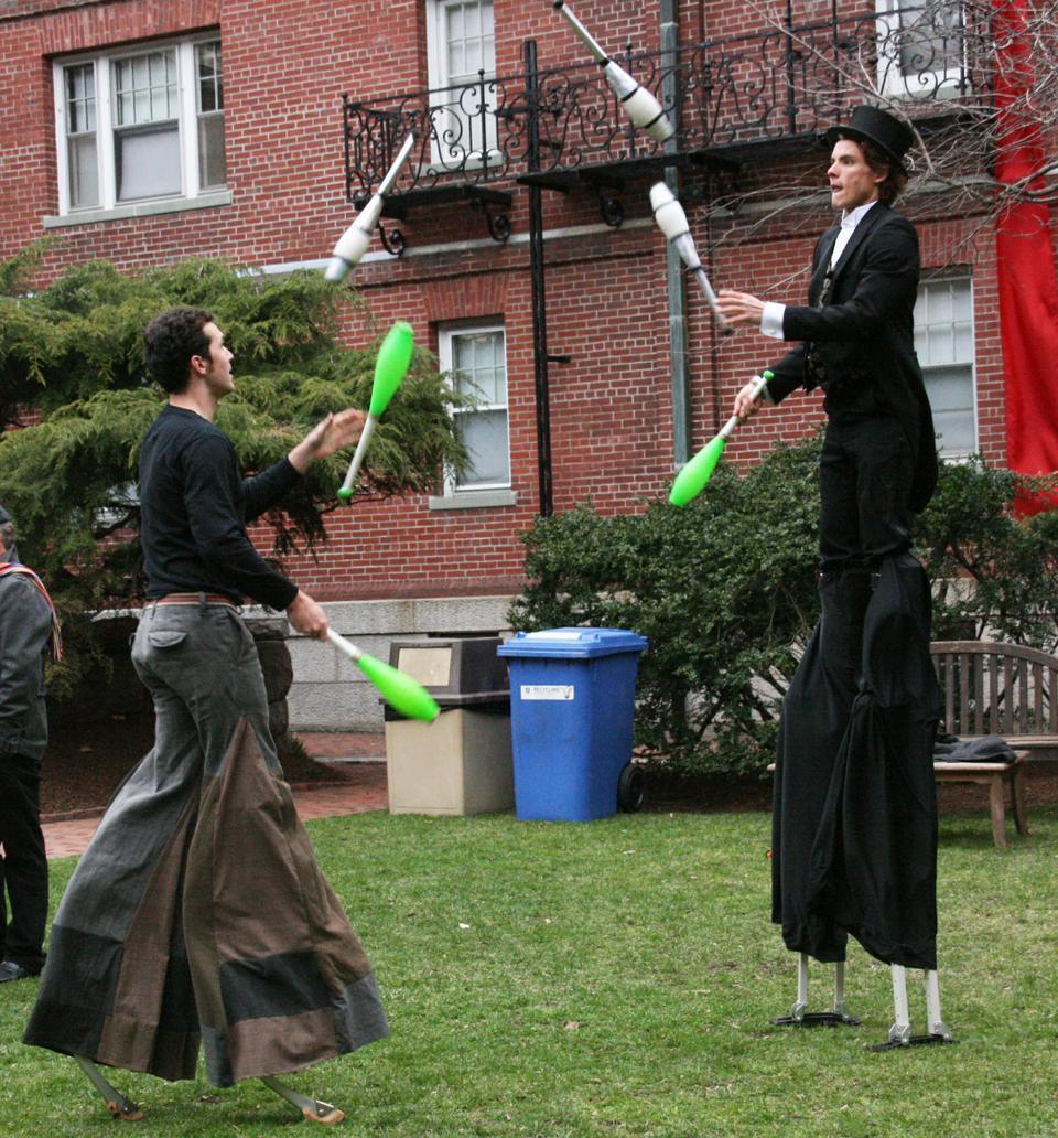 Clowns on stilts provide entertainment at the Adams Masters' 250th year anniversary celebration. 