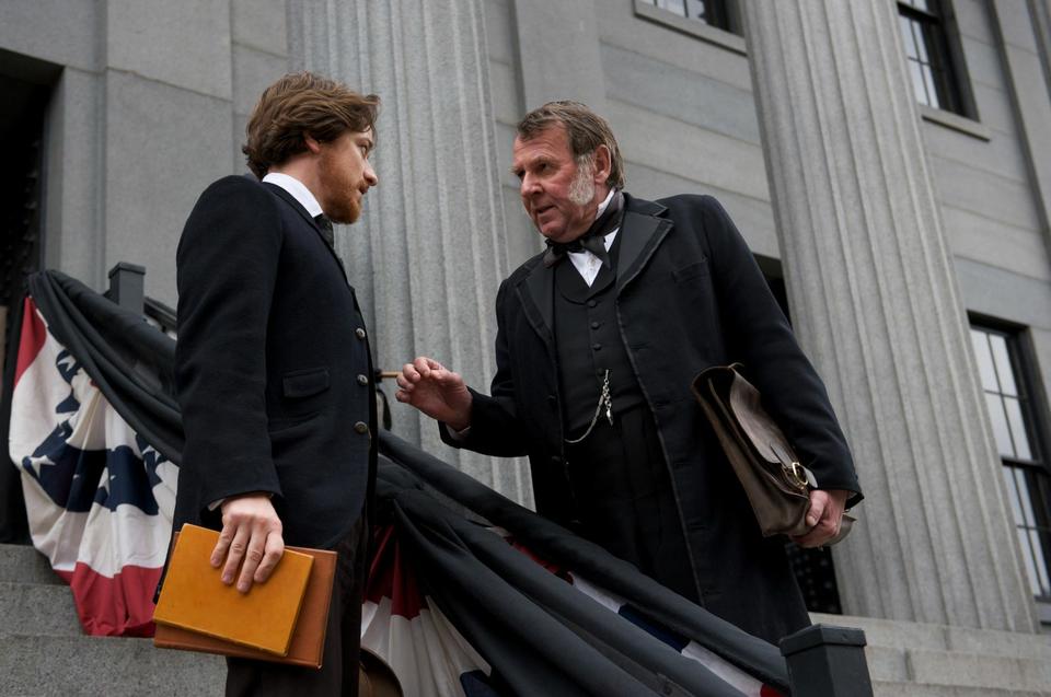 Frederick Aiken (James McAvoy) is mentored by Senator Reverdy Johnson (Tom Wilkinson) in “The Conspirator.”