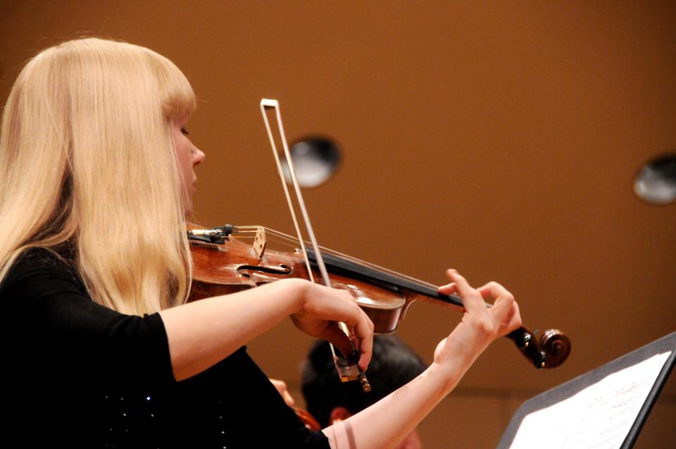 Violinist Julia Glenn '12, plays the tune of Hayakawa's Plum Blossom Country.