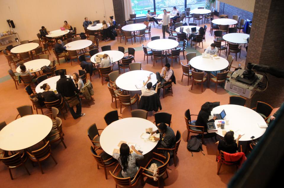 Law school students enjoy the food, company, and open space of their temporary student lounge in Pound Hall.