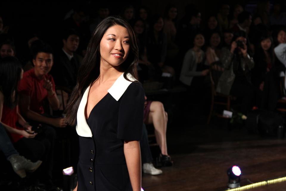 Rose Wang '13 strikes a pose at the end of the catwalk during Identities on Friday night. The annual fashion show was held in Harvard's historic Annenberg Hall and featured Anna Sui as the guest of the night.