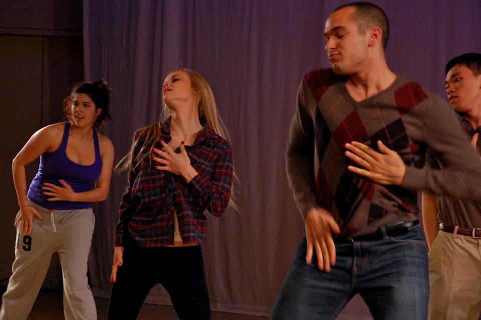 Members of the Harvard Expressions Dance Company perform in their hip-hop dance show, Exception, which attracted a large audience to Lowell Lecture Hall on Friday night.