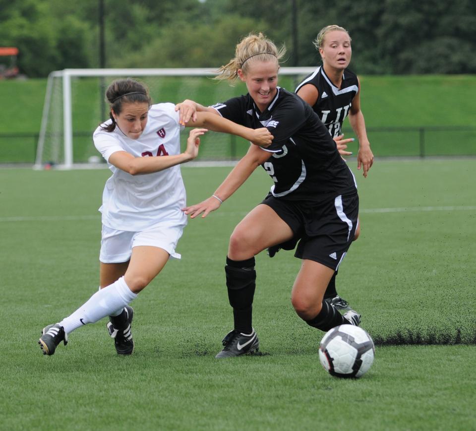 Rookie Elizabeth Weisman, shown above in earlier action, had a standout performance for the Crimson against the Irish women’s national team on Friday. Harvard was first to strike thanks to junior Rebecca Millock’s goal, and junior Sophie Legros hit the game-winner to set the final score, 2-1.