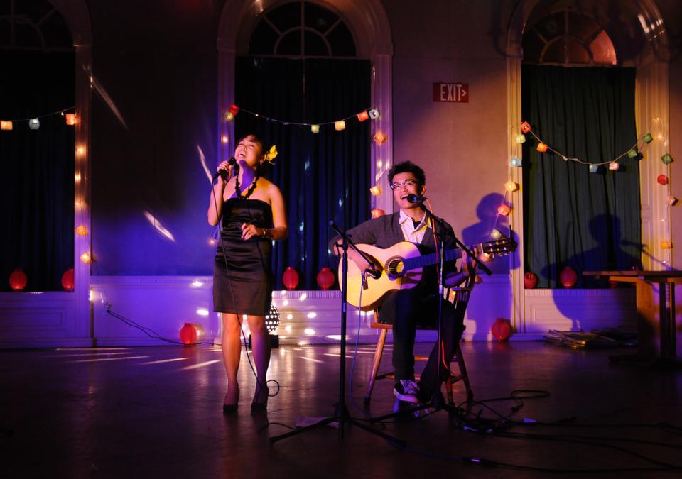 Riana Balahadia '14 and Will Simbol, who is pursuing a Harvard Master’s degree in Arts in Education, sing a Filipino ballade titled "Kailangan Kita" (I Need You) at SEA Night 2011.

