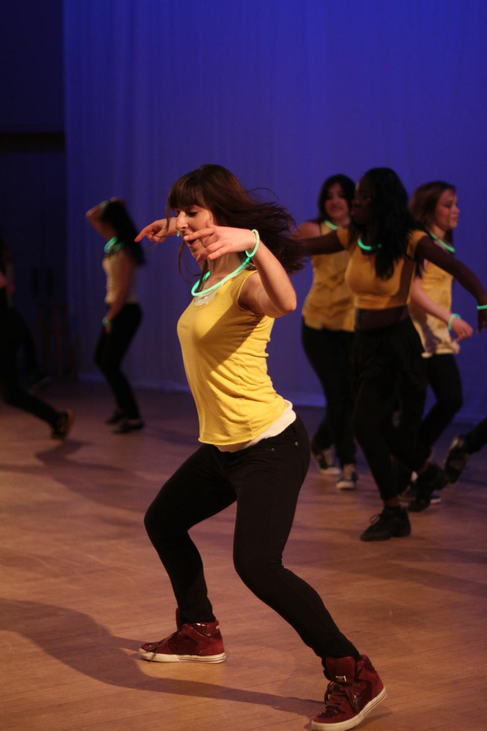 Expressions member Shira B. Kogan '14 dances with the Expressions traveling dance team during the second half of Friday's show. 