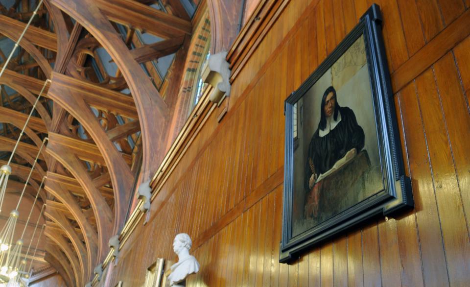 A portrait of Caleb Cheeshahteaumuck, one of Harvard’s first Native American graduates, hangs in Annenberg dining hall. 