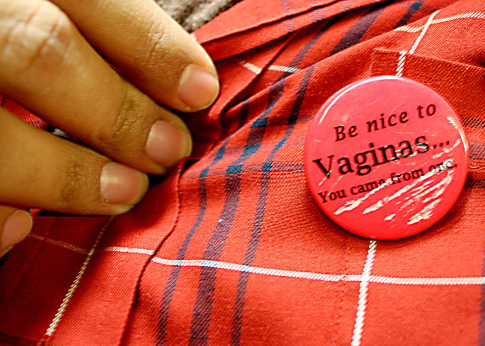 A member of the Radcliffe Union of Students sports buttons to convey the group’s message during a rally on Feb. 27 2011. RUS is also known for their popular “This Is What a Feminist Looks Like” Facebook campaign.