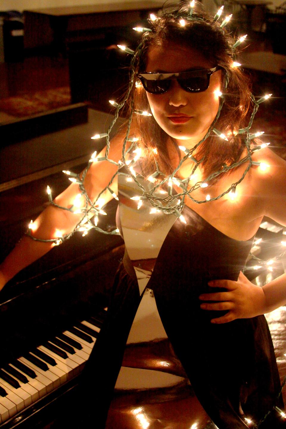 Crimson FM Editor Grace Sun ‘13 models some ideas for the Lady Gaga-inspired production of “Chicago” performed at Club Oberon this winter.
