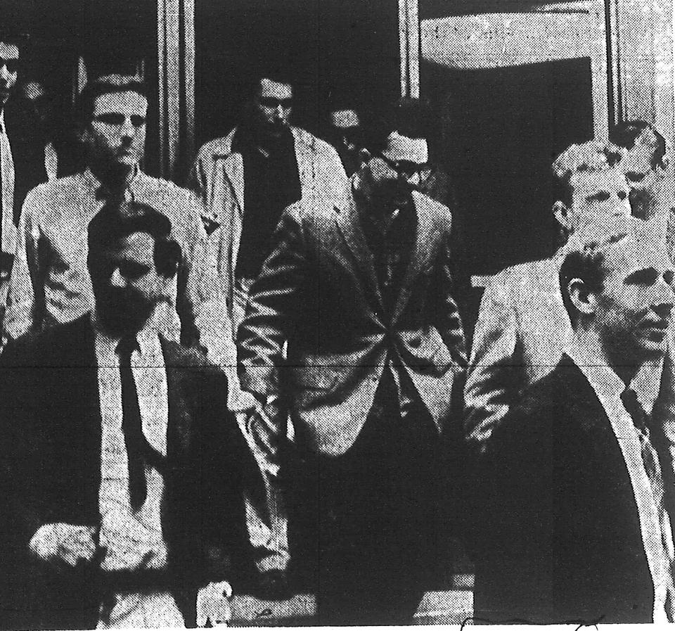 Students flood into Lamont Library on the night of April 28, 1961 amidst protests of a change in the language of Harvard diplomas from Latin to English.