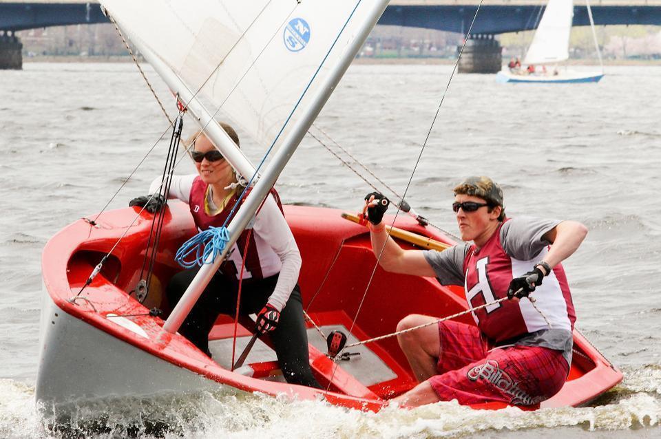 Freshman Ames Lyman, right, and freshman Alice Kenney go downwind in their Tech Dinghy earlier this season at the Wellesley/Babson Invite at MIT on Apr. 24. The co-ed team, led by five All-NEISA sailors, is ranked third in the nation and next week is headed to Oregon for nationals.