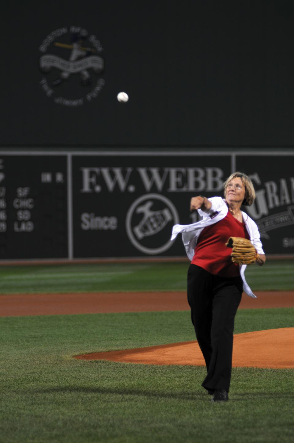 University President Drew G. Faust throws the opening pitch at Fenway park on Sept. 22, 2010. Before Faust stepped o the field, Harvard athletes that won national championships were recognized for their accomplishments. 