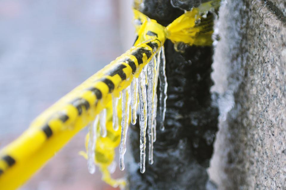 Bow Street in front of Adams' Westmorly Court is taped off due to the danger of falling ice in February.