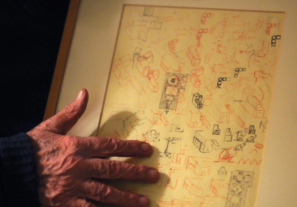Former Director of the Fogg Museum Seymour Slive shows a variety of concept sketches in the early planning stages of the Sackler Museum.  