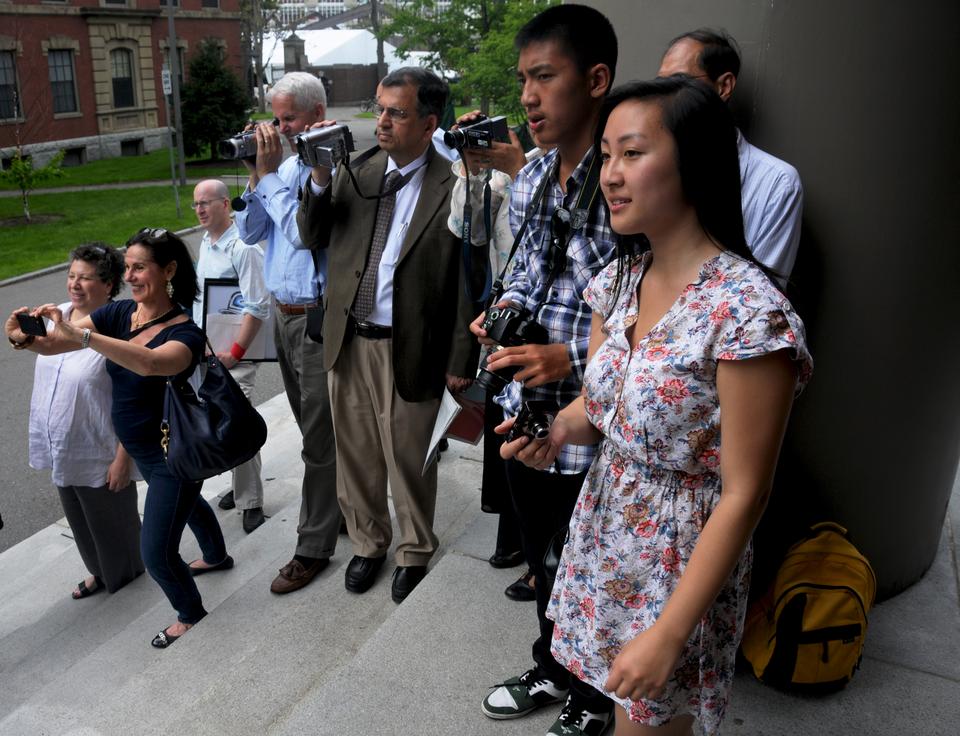 Friends and family of the Class of 2011 are proud and excited to take photos of their loved ones as they enter Memorial Church for the Baccalaureate Ceremony on Tuesday afternoon.
