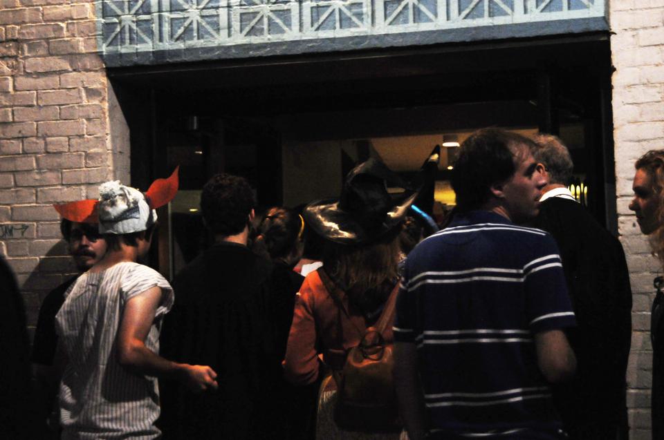 Moviegoers pour into the AMC Loews Harvard Square to see the new Harry Potter movie.