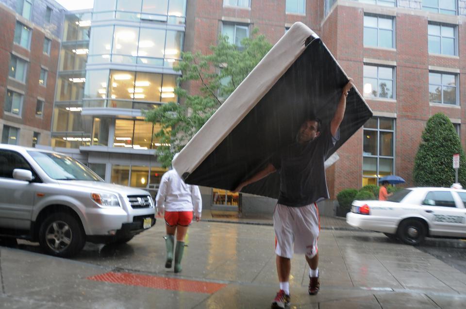 For many, move-in continued despite the heavy rain.