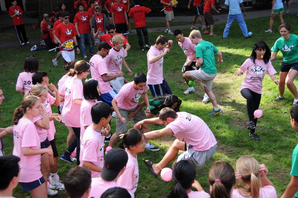 Upperclassmen battle each other in the first game of the day during Field Day held in Quincy's yard. Juniors and Seniors score the most points, followed by the staff and finally the Sophomores with no points.