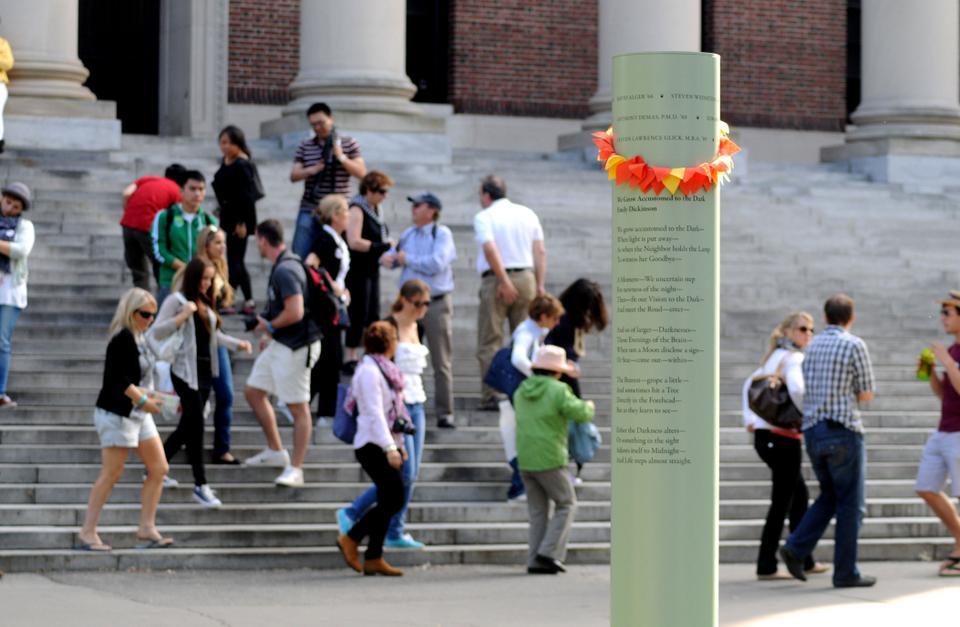 The bustle of Harvard Yard continues as the commemorative bell tolls of Memorial Church—ringing at the exact times that each of the planes crashed on the morning of the attacks—fill the surrounding area.
