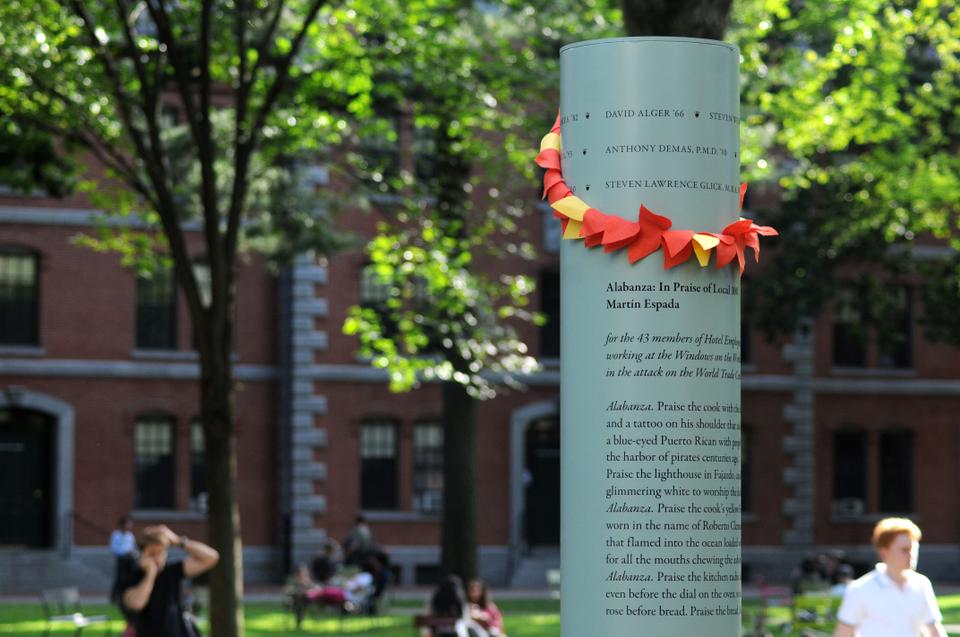 Four columns are erected in Harvard Yard bearing the names of Harvard affiliates lost in the September attacks.