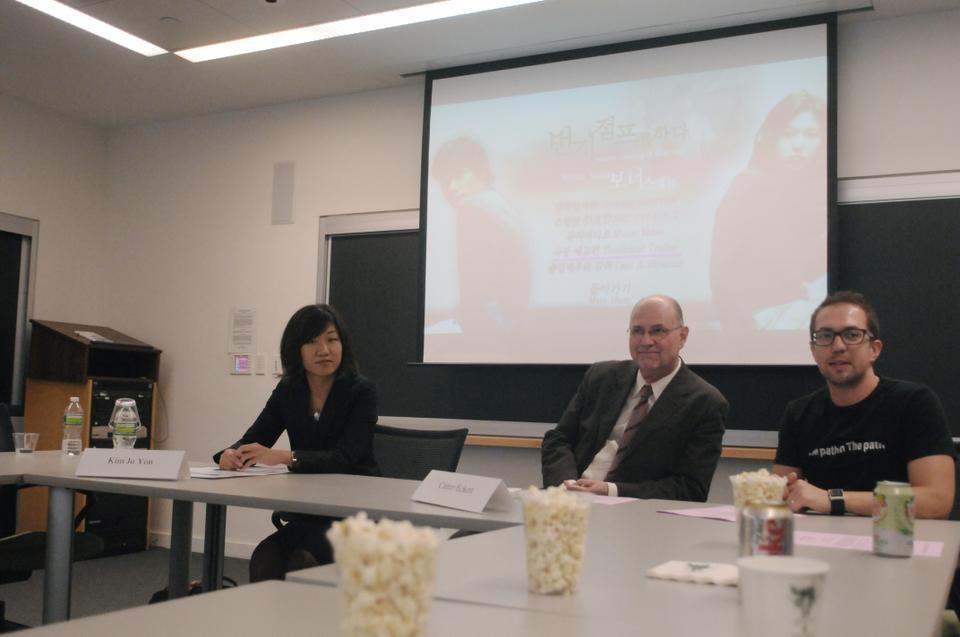 Professor Kim Ju Yon (left), Professor Carter J. Eckert (middle), and Curator Dima David Mironenko-Hubbs present “Bungee Jumping of Their Own” at the Harvard Center for Government and International Studies.