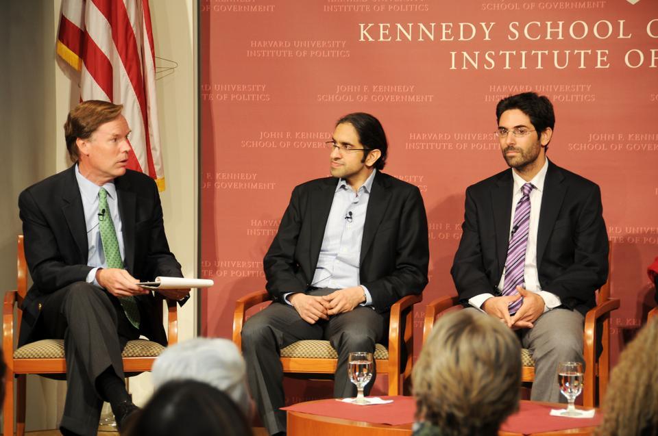 Prof. R. Nicholas Burns (left) moderates the discussion regarding the conflict in the Middle East during a forum at the Harvard Kennedy School of Government.