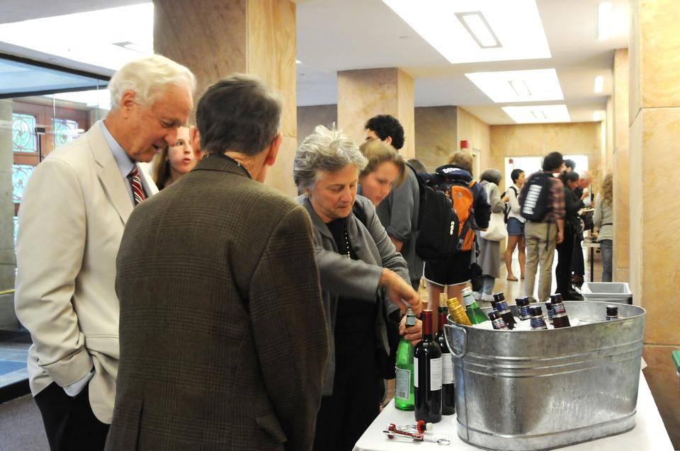 Richard T. T. Forman, Professor of Landscape Ecology at the Graduate School of Design, speaks with members of the audience at a reception following his talk on Biodiversity, Ecology, and Global Change yesterday. 