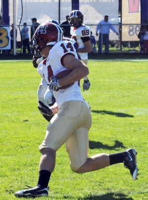 Former Crimson wideout Mike Cook '10 is playing for the Herlev Rebels in Norway this season—one of a number of Crimson football alums continuing their careers around the world.
