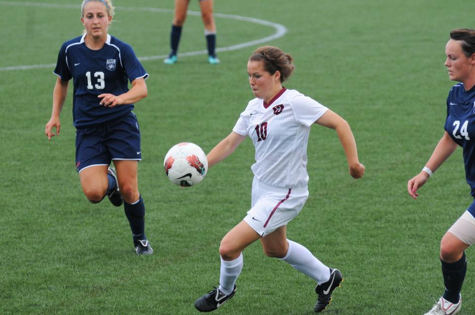 Co-captain Melanie Baskind, shown here in action two days later against New Hampshire, knocked in two first-half goals to help Harvard take down Ivy League titleholder Penn, 2-0, on Friday night. Freshman goalkeepers Cheta Emba and Bethany Kanten teamed up to put together a shutout.
