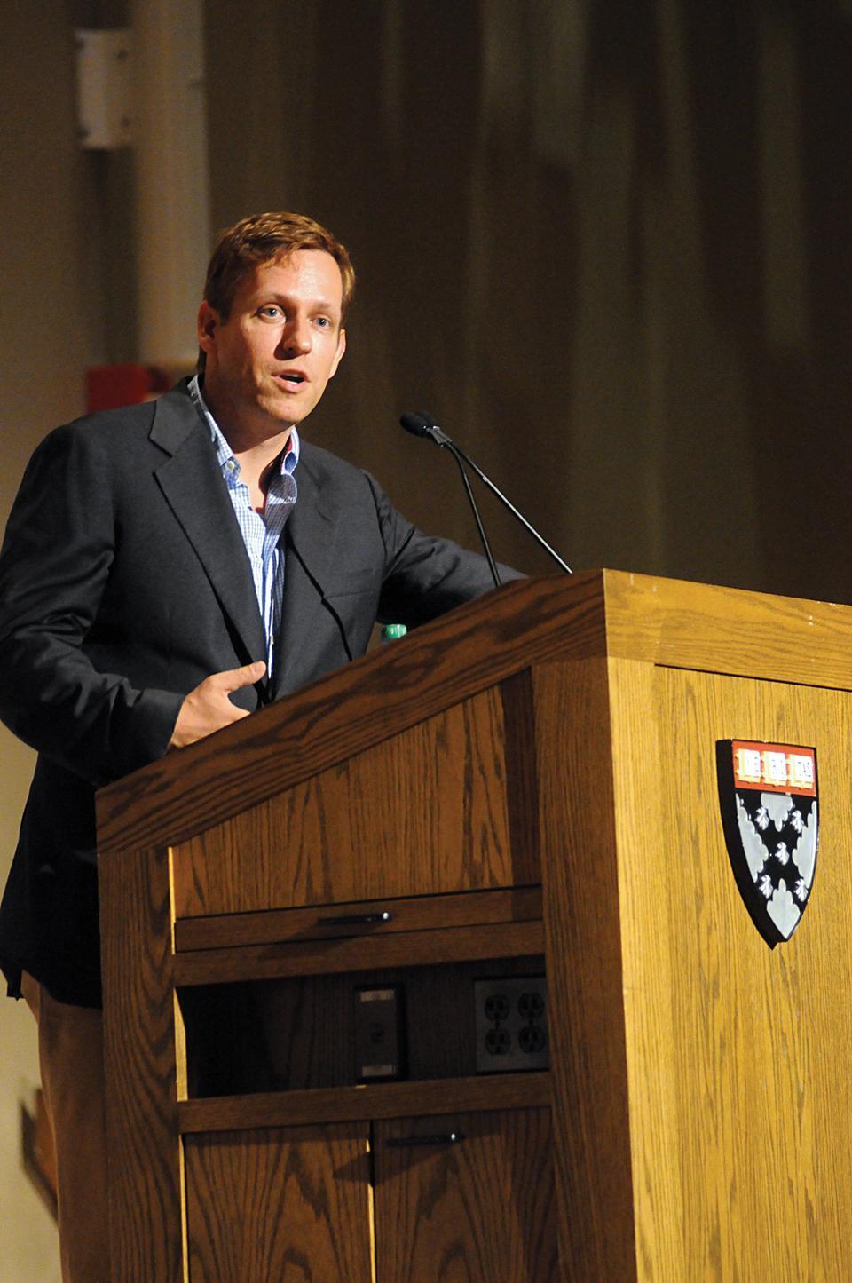 Peter A. Thiel, the co-founder of PayPal and first outside investor in Facebook, questions how entrepreneurs and business ought to divide their focus between globalization and pushing technology and innovation at the Business School yesterday. His talk was hosted by the Harvard innovation lab.