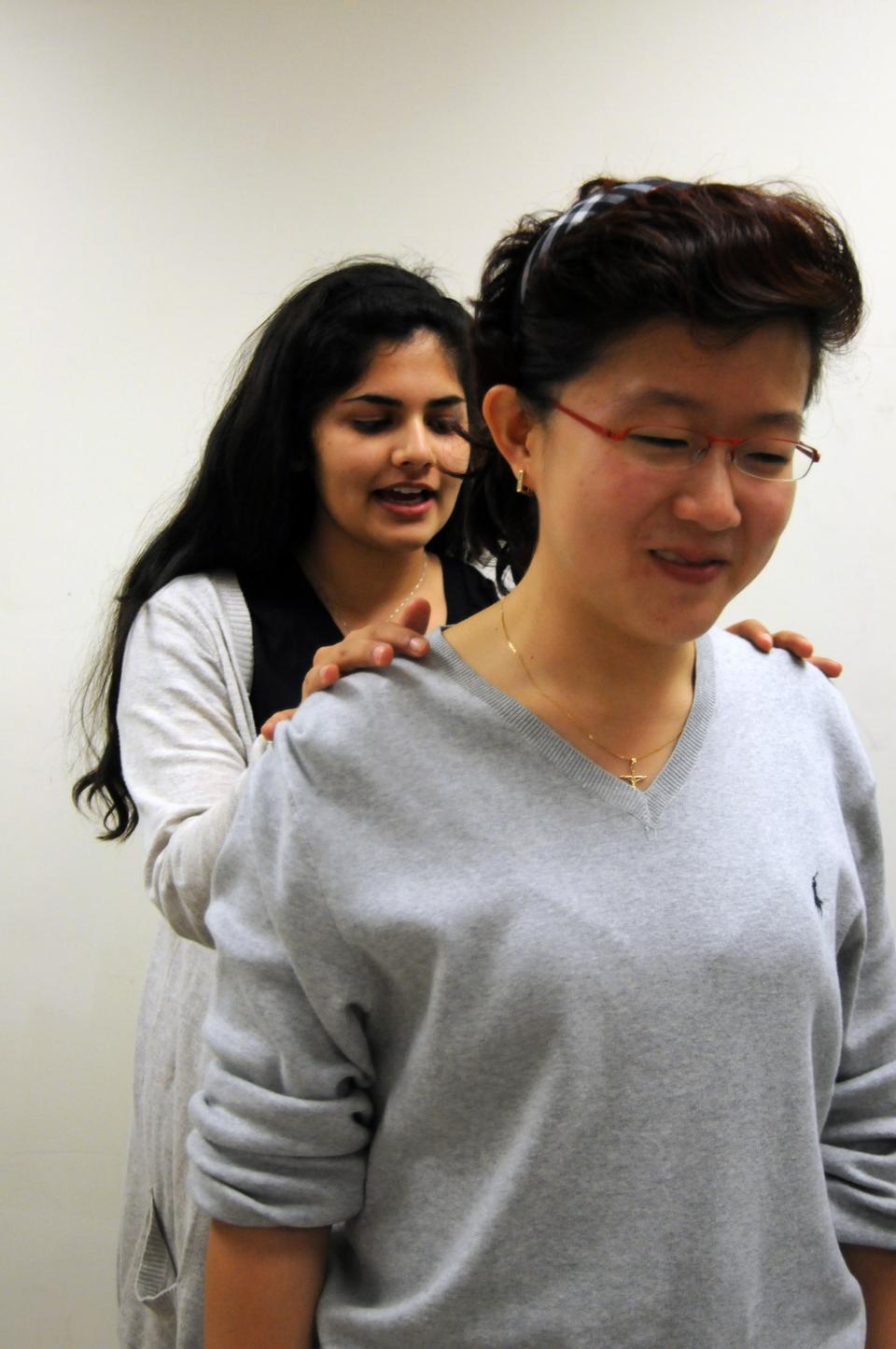 Finish the massage by gently brushing off the person’s shoulders, back, and arms. You don’t want to abruptly end a massage, so dusting is the perfect subtle finish.