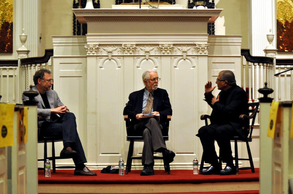 Harvard Divinity Professor Harvey Cox takes a central, moderating position between physicist and Caltech Professor Leonard Mlodinow in grey and Dr. Deepak Chopra at First Parish Church Wednesday night to discuss the War of the Worldviews: Science vs. Spirituality, the book Mlodinow and Chopra recently co-authored.