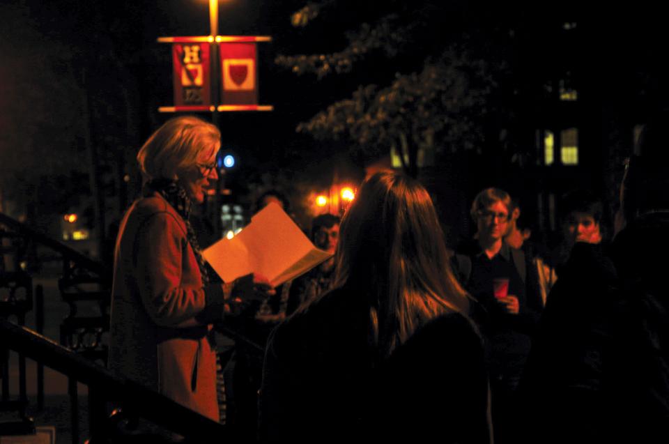 Reverend Dorothy Austin addresses a crowd of students at the LGBTQ vigil held on Wednesday. University President Drew G. Faust also spoke of Harvard’s intolerant past at the Queer Students and Allies-sponsored event.