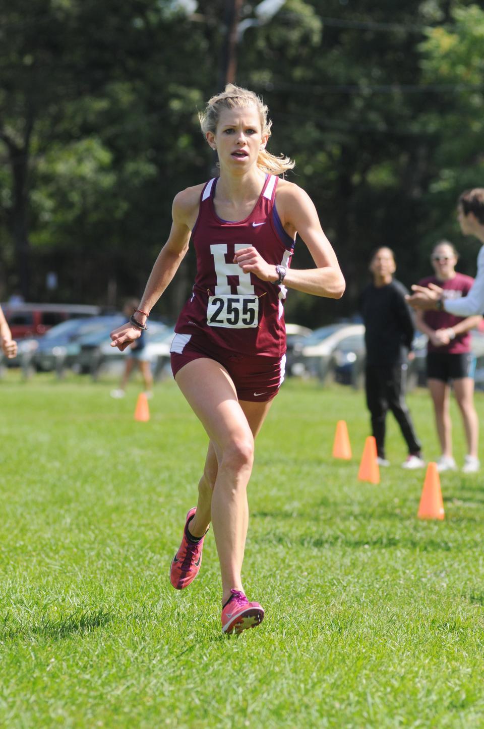 Senior Kailyn Kuzmuk, shown above in previous action, finished in 198th place, nine seconds behind senior Jeanne Mack, who came in 171st place. The Crimson men raced without their top runners, sophomore James Leakos and rookie Billy Orman. Sophomore Aaron Watanabe finished 13th.