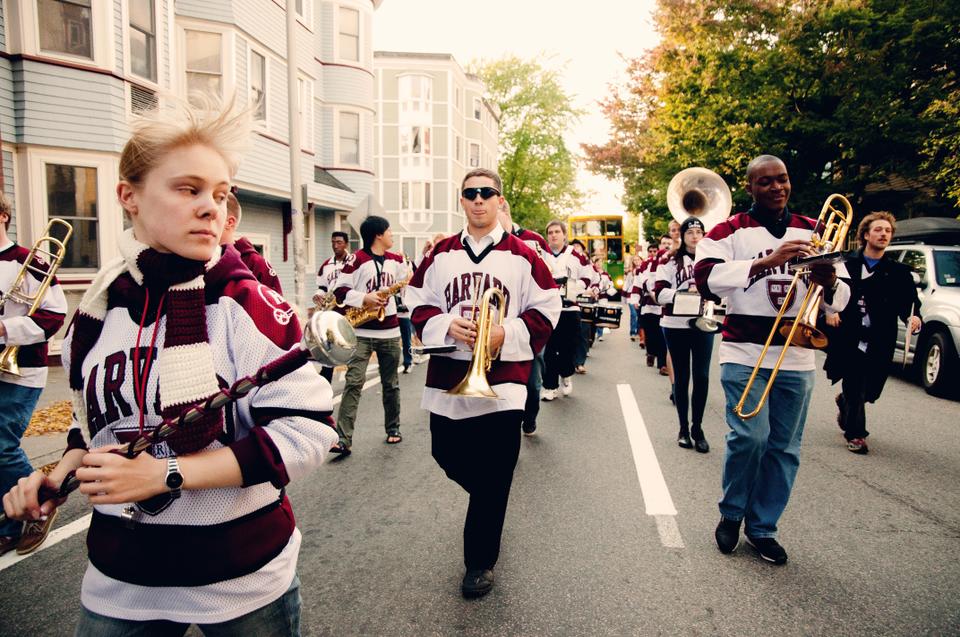 Tanya Avilova '13, drum major of the Harvard University Band, leads the players and the two buses down to Harvard Square for the Bruins' Stanley Cup celebration.