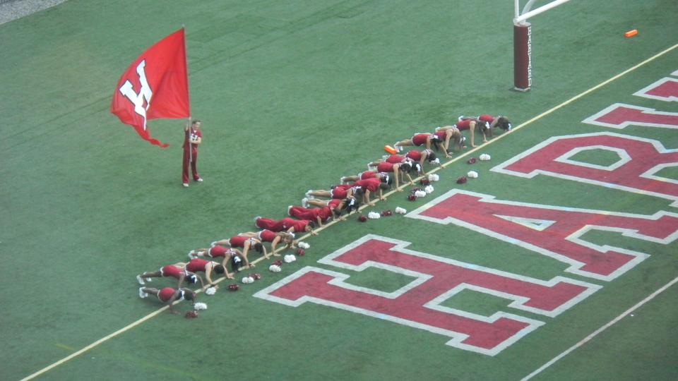 Because the Harvard football team has scored 98 points in its last two games, the Crimson cheerleaders, pictured in the Bucknell game, have been put to work.