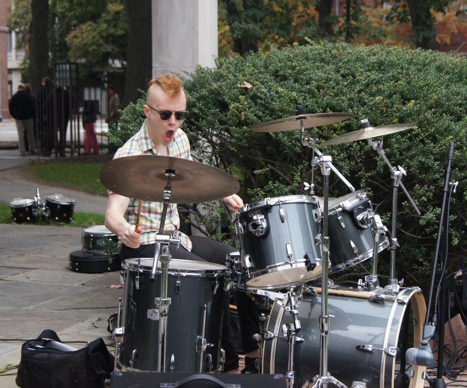 Mark R. Parker '12 gives a crowd-pleasing performance on the drums as he plays with his band.     