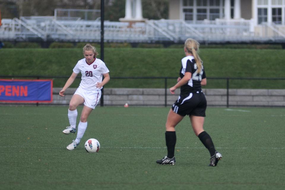 Freshman Lauren Urke, pictured above in previous action, came to Harvard with two strengths: soccer and music. Although she dons a Crimson jersey, she also brought her violin to continue both passions.