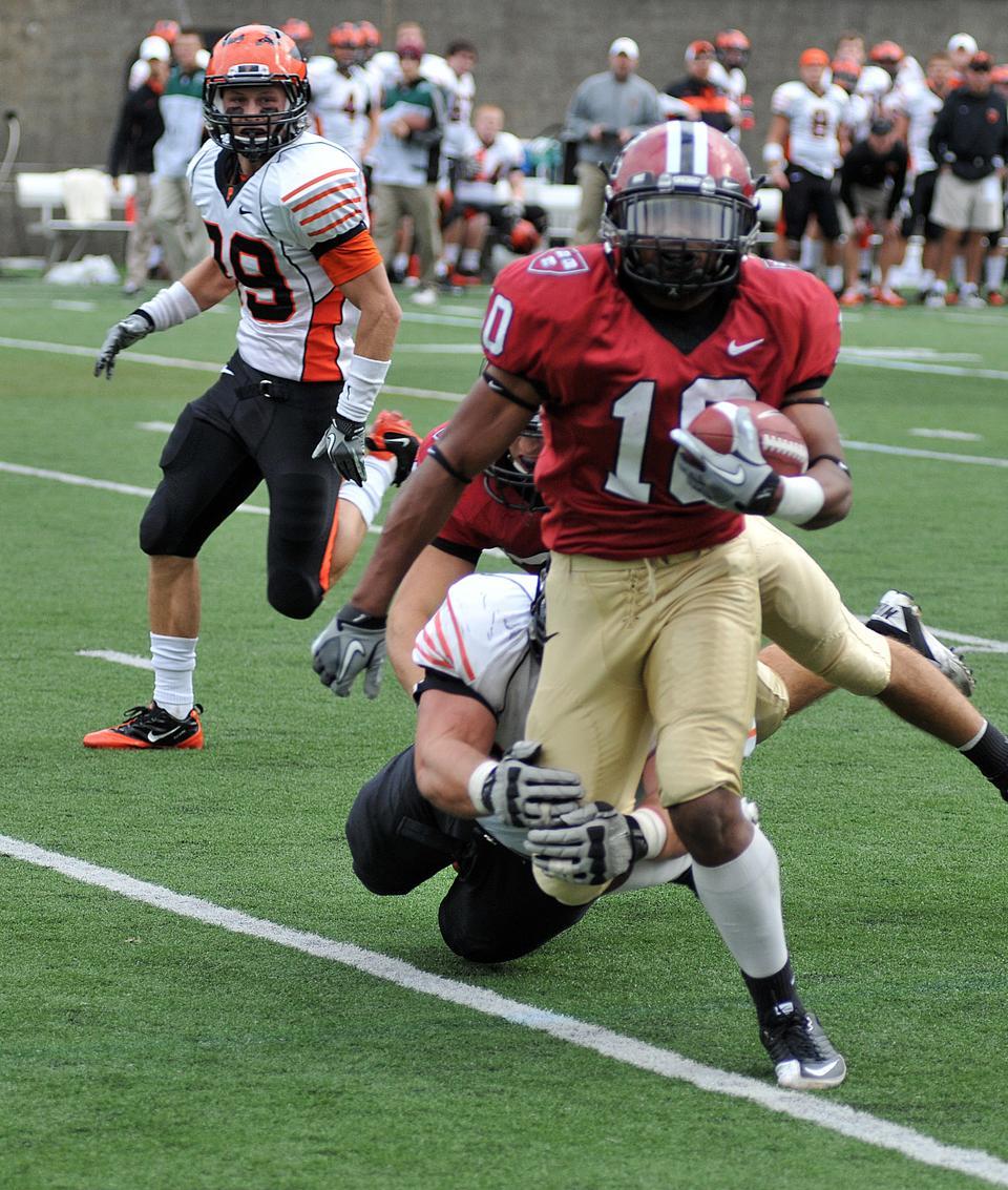 On October 15 against Bucknell, freshman wide receiver Seitu Smith III became the first Harvard rookie to ever return a kickoff for a touchdown. Smith’s 31.1 yards per kick return average is fourth-best nationally. He is pictured in action against Princeton.