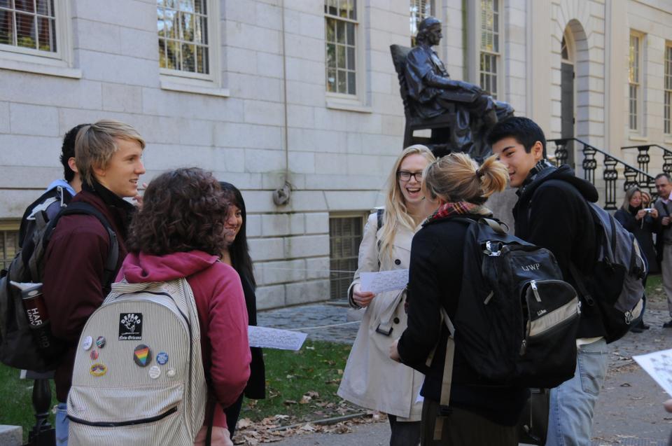 Harvard students gather in front of John Harvard statue in solidarity with the Occupy Movement and Occupy Oakland.