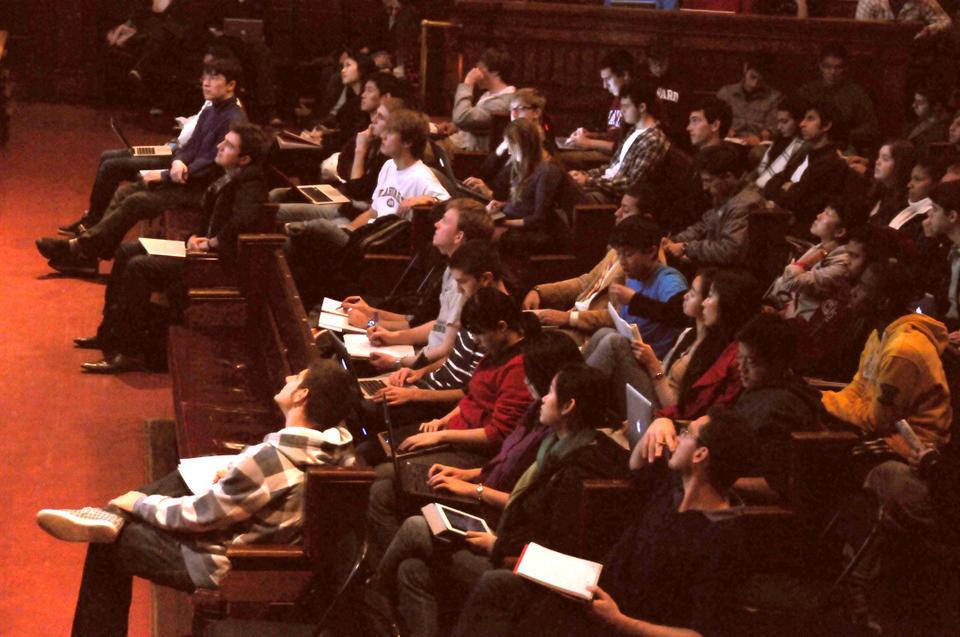 Around sixty students left the Economics 10 lecture in Sanders Theater at 12:15pm. Pictured here is the front few rows of lecture after the walkout.