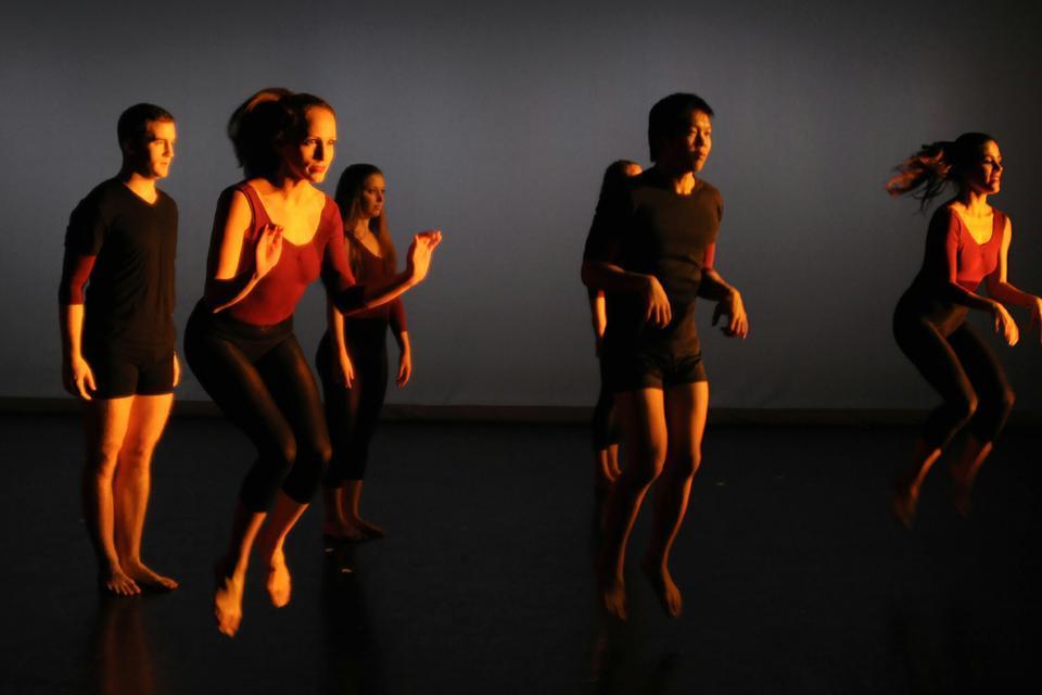 Dancers leap in Jun Shepard’s piece ‘14 “Izonchuu,” set to “Violin Sonata” by Poulenc. The show combined popular, classical, and alternative music, allowing for diverse performances.