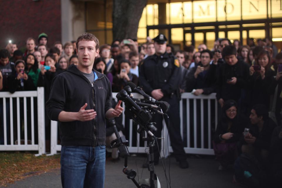 Famous Harvard-dropout and Facebook founder Mark E. Zuckerberg speaks to the press before attending a selective recruiting event intended to attract Harvard's best and brightest to careers at Facebook in November 2011. 