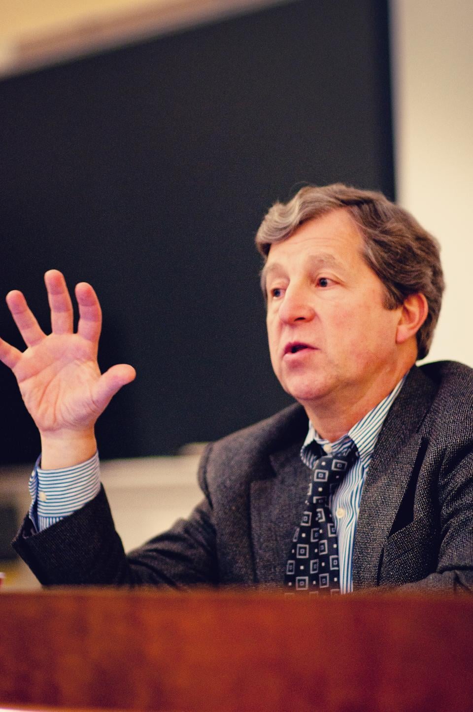 Charles A. Nelson, Professor of Pediatrics at Harvard Medical School, discusses his research on Romanian orphans in Harvard Hall yesterday.