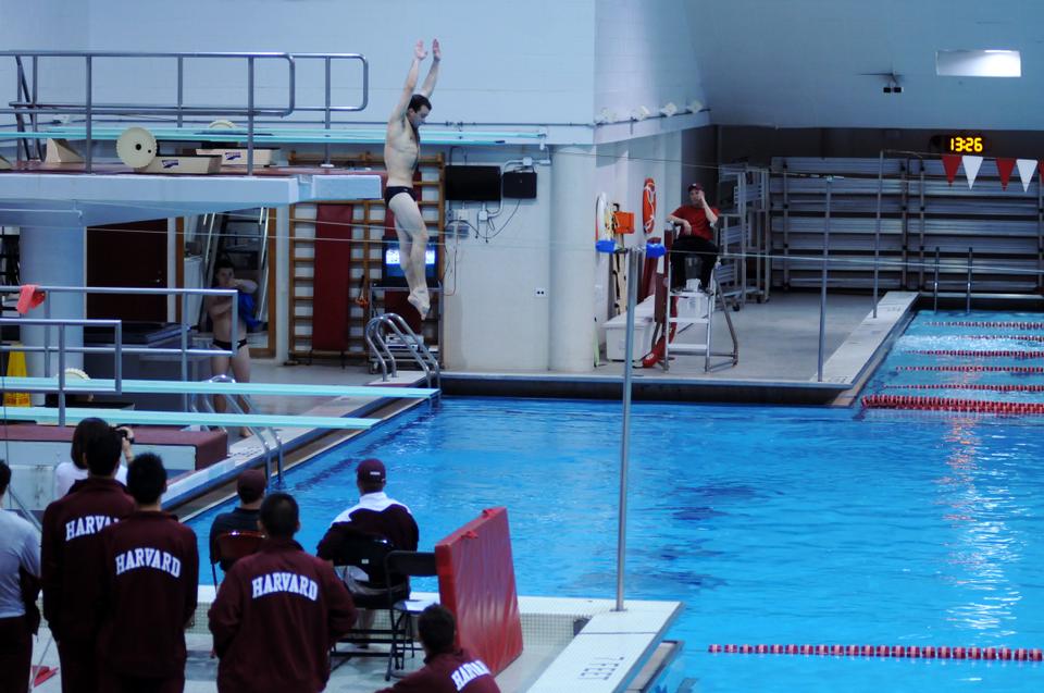 The Crimson's men's diving team faced off against Texas A & M this Friday at the Blodgett pool. A Harvard diving team member starts his dive. 
