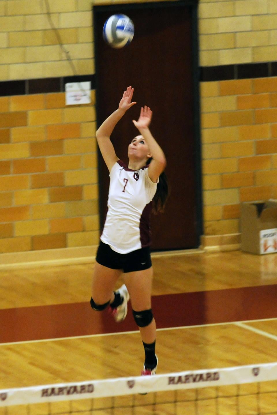 Harvard junior Olivia Staffon (7) shows off her jump serve in a game against Yale on Friday, November 11th.