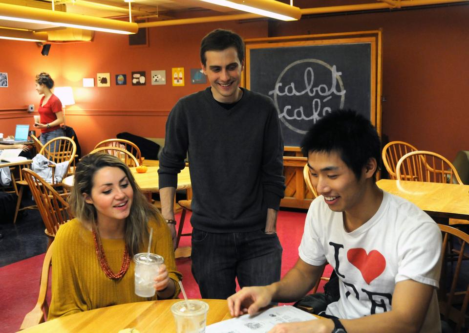 Undergraduate Council presidential candidate Crystal D. Trejo ’13 (left) and running mate David H. A. LeBoeuf ’13 chat with a student during a UC-sponsored event for juniors on Sunday in Cabot Cafe.